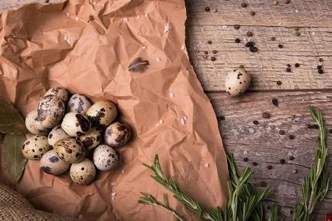 Colorful easter eggs on a rustic wooden surface Stock Photos