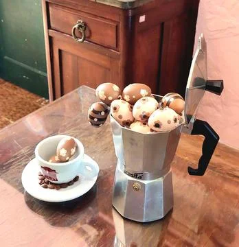 Colorful easter eggs served in a cup Stock Photos