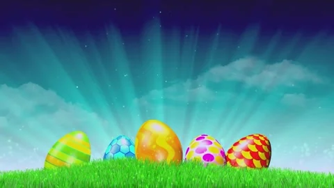 Colorful Easter eggs sitting on green grass under a magical sky Stock Footage 332911017