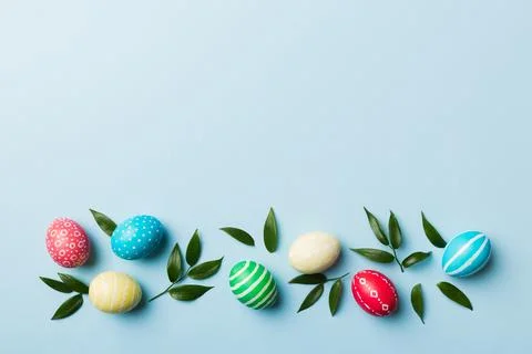 Colorful Easter eggs with spring flower leaf isolated over white background.  Foto stock