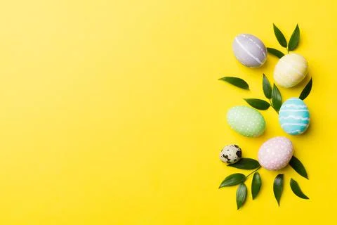 Colorful Easter eggs with spring flower leaf isolated over white background.  Stock Photos