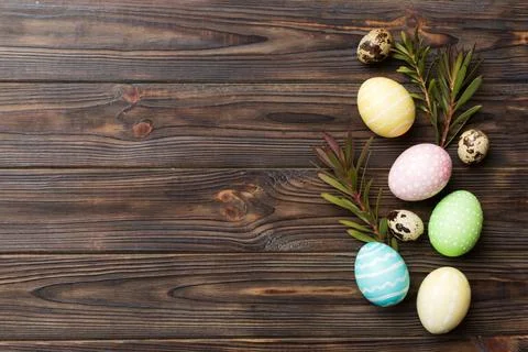 Colorful Easter eggs with spring flower leaf isolated over white background.. Stock Photos
