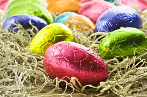 Colorful easter eggs in straw Stock Photos
