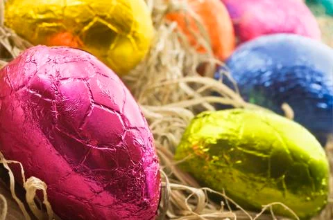 Colorful easter eggs in straw Stock Photos