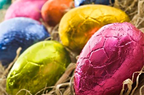 Colorful easter eggs in straw Stock Photos