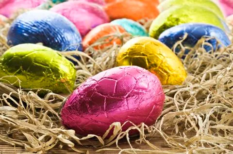 Colorful easter eggs in straw Stock Photos