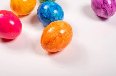 Colorful Easter eggs on table for celebration of catholic Easter in april, .. Stock Photos