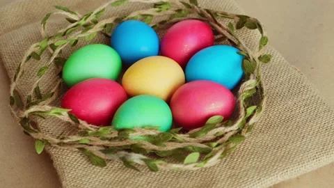 Colorful Easter eggs, top view. Abstract festive background. Видео 238427887