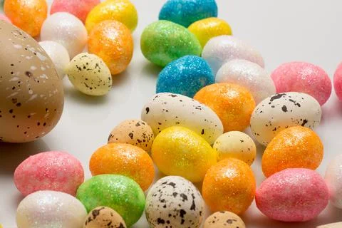 Colorful easter eggs top view on white background Stock Photos
