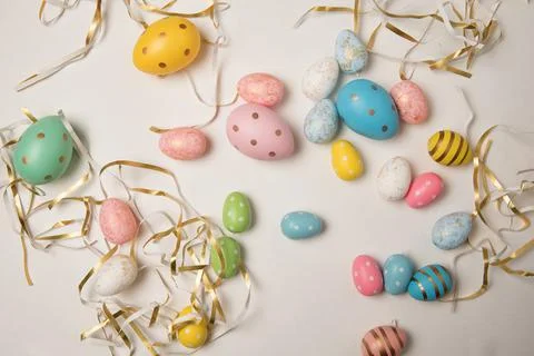 Colorful Easter eggs on white background. Happy easter. Top view Stock-Fotos