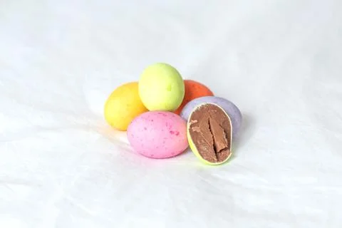 Colorful easter eggs on a white sheet Stock Photos