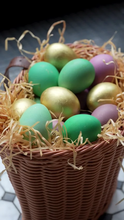 Colorful Easter Eggs in Wicker Basket with Straw. A wicker basket filled wi.. 스톡 동영상 331215076