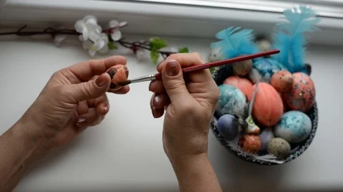 Colorful easter eggs on the window Stock Footage 102842981