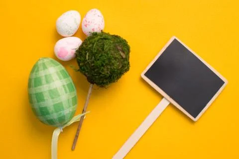 Colorful Easter eggs on a yellow background Stock Photos