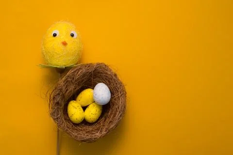 Colorful Easter eggs on a yellow background Stock Photos