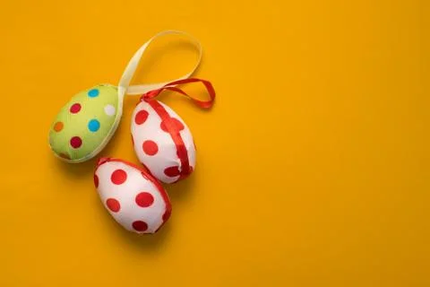 Colorful Easter eggs on a yellow background Stock Photos