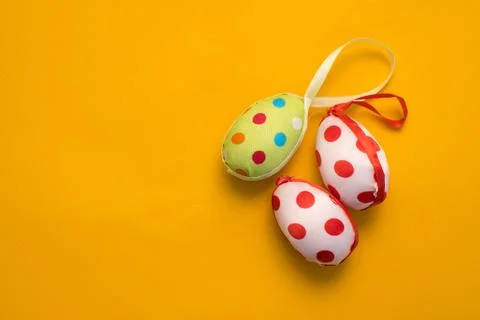 Colorful Easter eggs on a yellow background Stock Photos