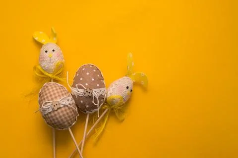 Colorful Easter eggs on a yellow background Stock Photos