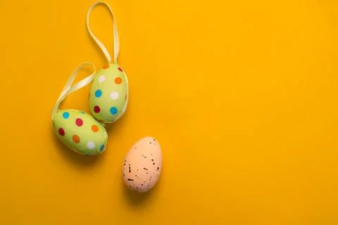 Colorful Easter eggs on a yellow background Stock Photos
