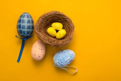Colorful Easter eggs on a yellow background Foto stock