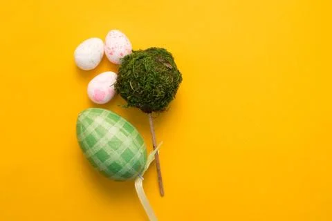 Colorful Easter eggs on a yellow background Stock Photos