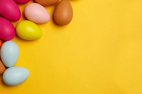 Colorful Easter eggs on a yellow background Stock Photos