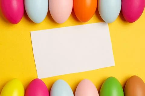 Colorful Easter eggs on a yellow background Foto stock