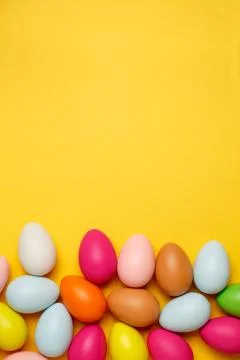 Colorful Easter eggs on a yellow background Stock Photos