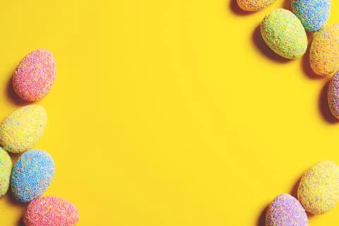 Colorful easter eggs on yellow background. Foto stock