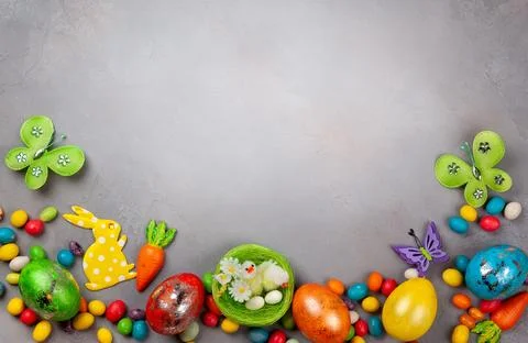 Colorful Easter eggs,chocolate Easter sweets and bunny Stock Photos