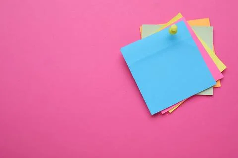 Colorful empty notes pinned on pink background, space for text Stock Photos