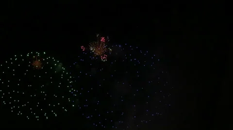 Colorful exploding fireworks over the lake. Stock Footage 61677053