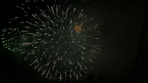 Colorful exploding fireworks over the lake. Stock Footage 61679396