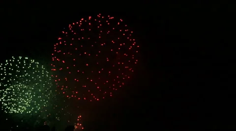 Colorful exploding fireworks over the lake. Stock Footage 61679855