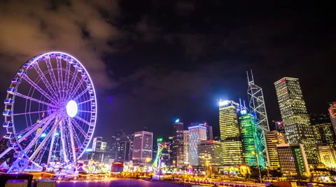 Colorful Ferris wheel with a darkening sky. Hongkong. Timelapse Stock Footage 59129602