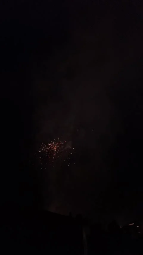 Colorful festival fireworks display exploding over Olot, Spain at night Stock-Footage 345047735