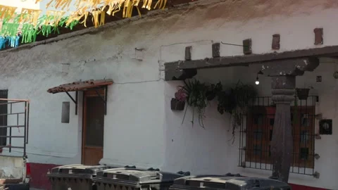 Colorful Festive Decorations on Rustic Mexican Building in Tapalpa Jalisco Stock Footage 345551304