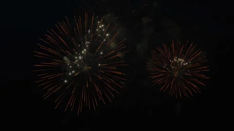 Colorful festive fireworks on a dark background Stock Footage 334590465