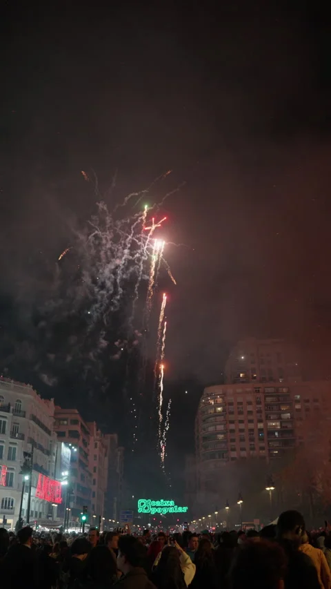 Colorful firework display over Valencia boulevard during Las Fallas festival Stock Footage 334295743