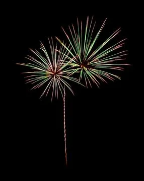 Colorful firework sparkling on black background for celebration and anniversa Stock Photos