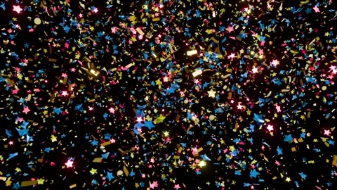 Colorful fireworks of colored confetti explodes on a  black background Stockbeeldmateriaal 319941274