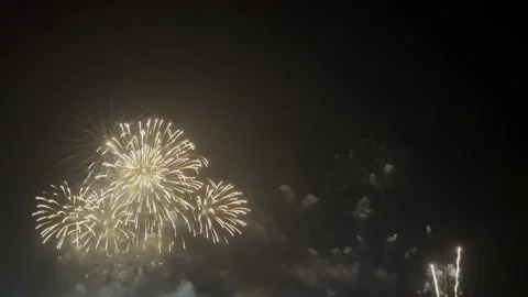 Colorful fireworks display at count down to new year festival night. Zoom out Stock Footage 235541783