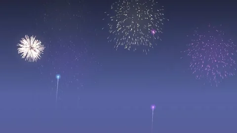 Colorful Fireworks Display Exploding in a Dark Blue Night Sky Stockbeeldmateriaal 345311211