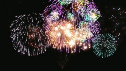 Colorful Fireworks Display Exploding in Night Sky Celebration Overlay Stock Footage 336717100