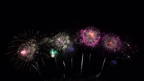 Colorful fireworks display night background Stock Footage 111907155