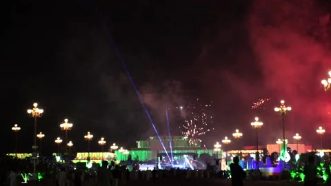 Colorful fireworks that explode and fill the darkness of the night sky with  Stock Footage 204601194