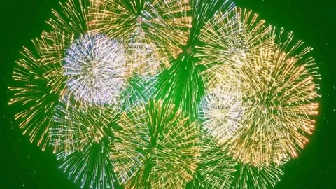 Colorful fireworks explode in corners on green screen background Stock Footage 331766614
