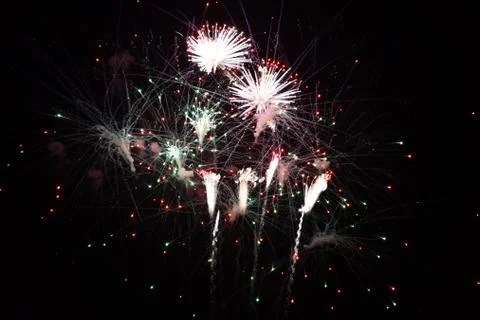 Colorful fireworks explode in sky Foto stock