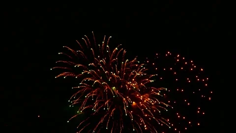 Colorful Fireworks Exploding Against Black Night Sky Stock Footage 342058025