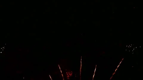 Colorful Fireworks Exploding Against Black Night Sky Stock Footage 342058673